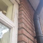 Spinnenwebben op het balkon